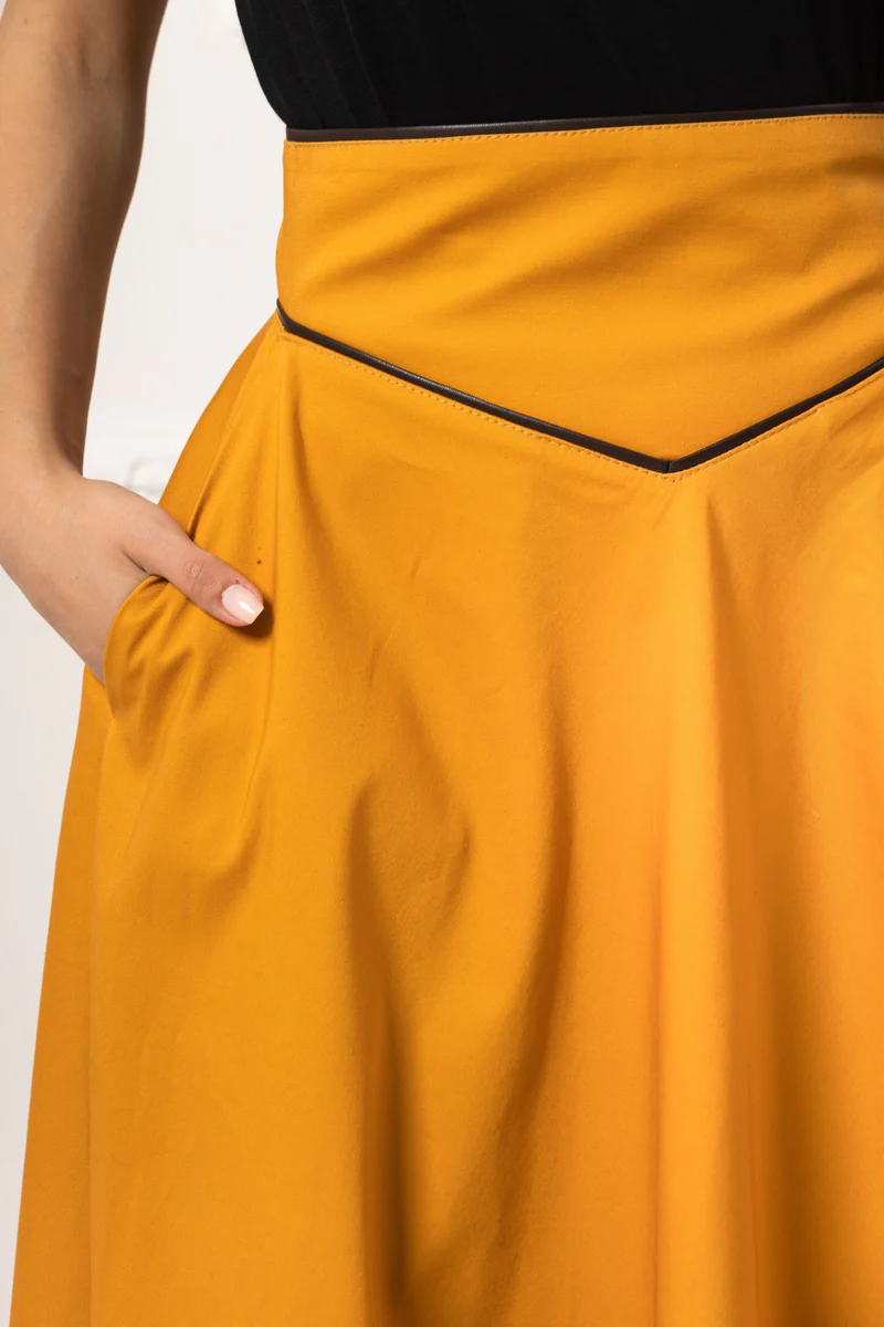 Pocket detail close-up on skirt