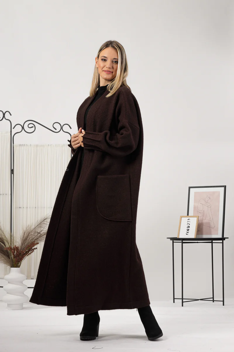 Long wool cardigan paired with boots.