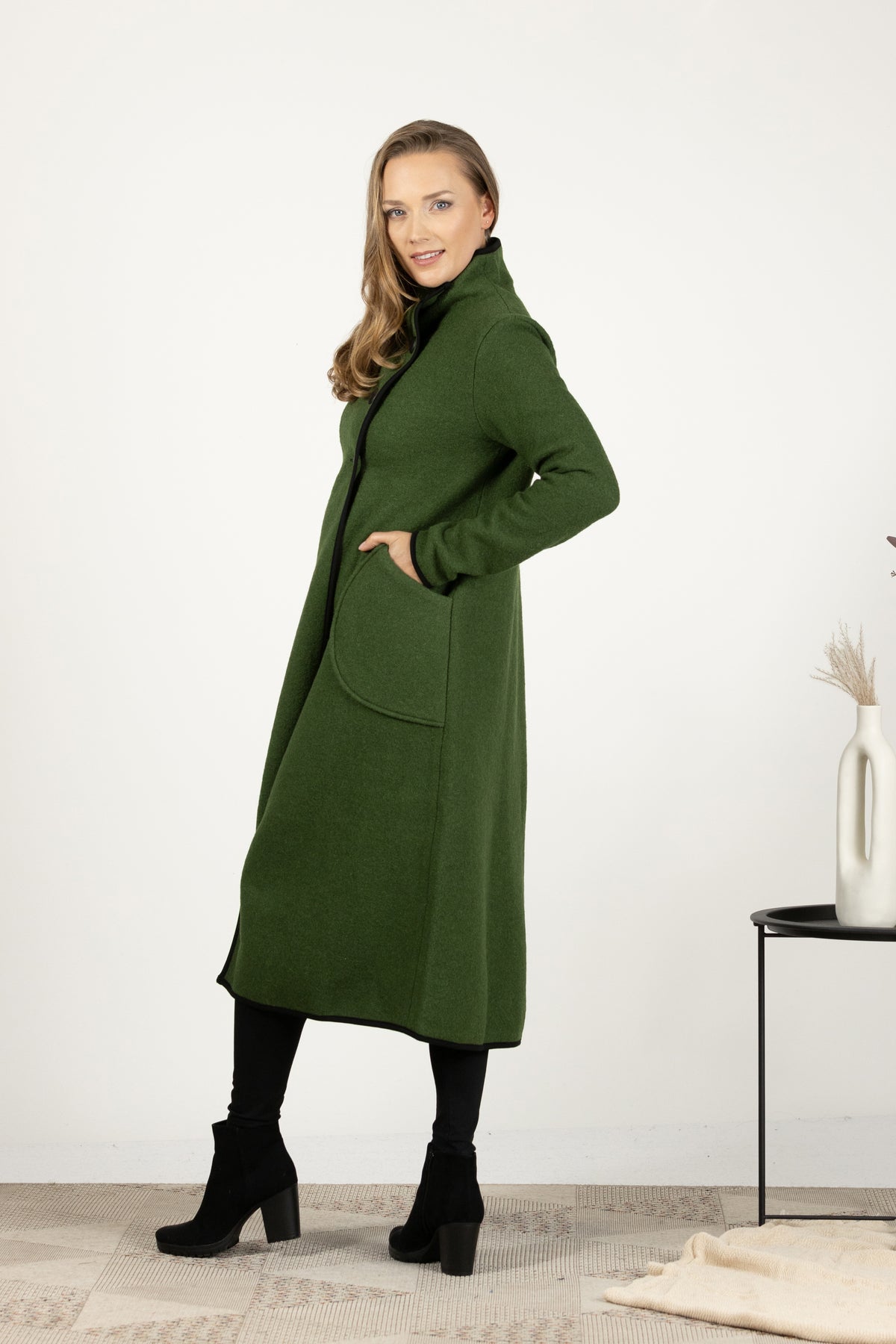 Back view of Elegant wool coat in raspberry with high neckline