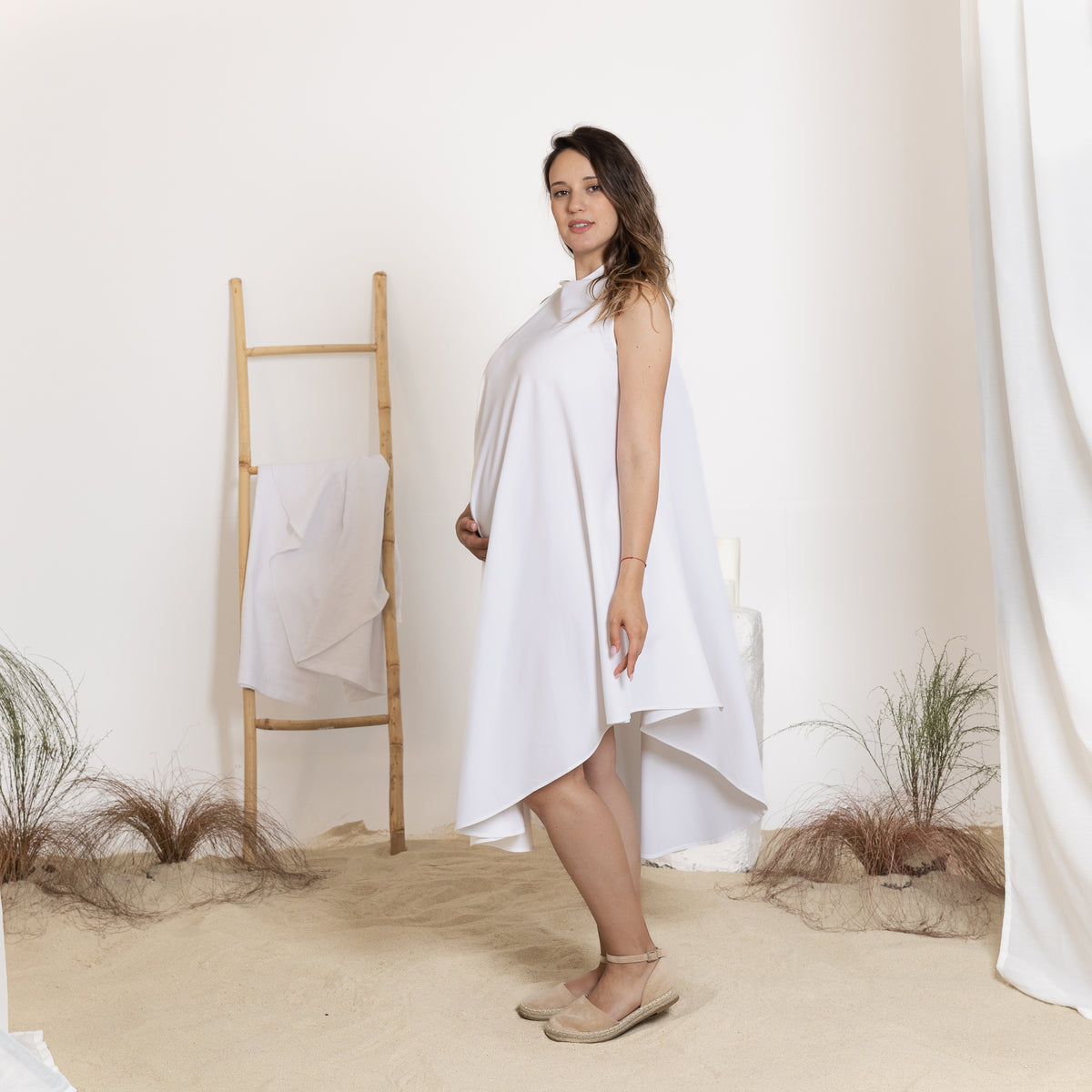 Side view of midi white dress