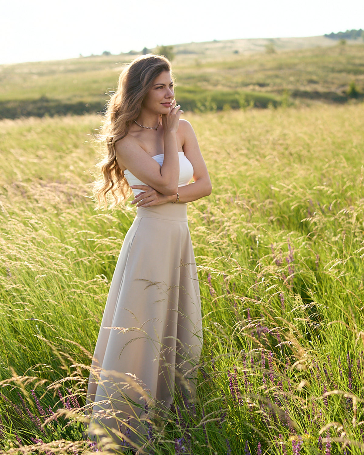 Side view of maxi beige skirt