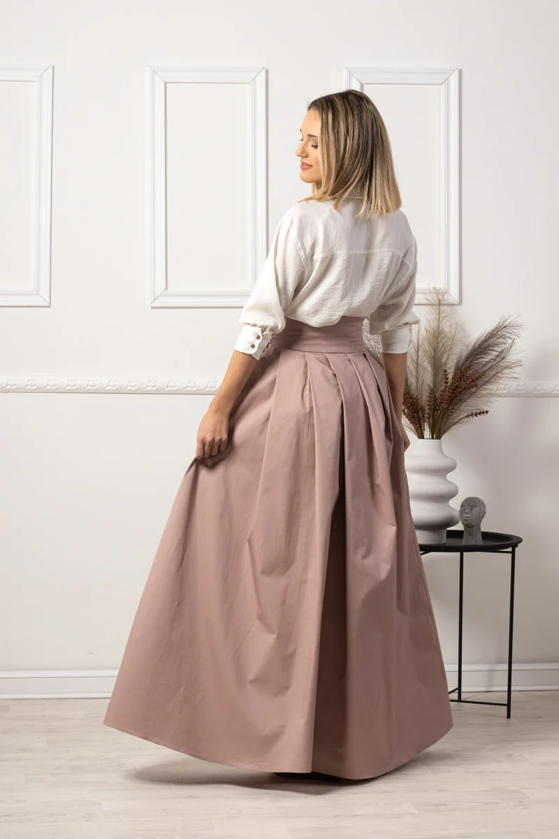 Back view of pink maxi skirt styled with blouse