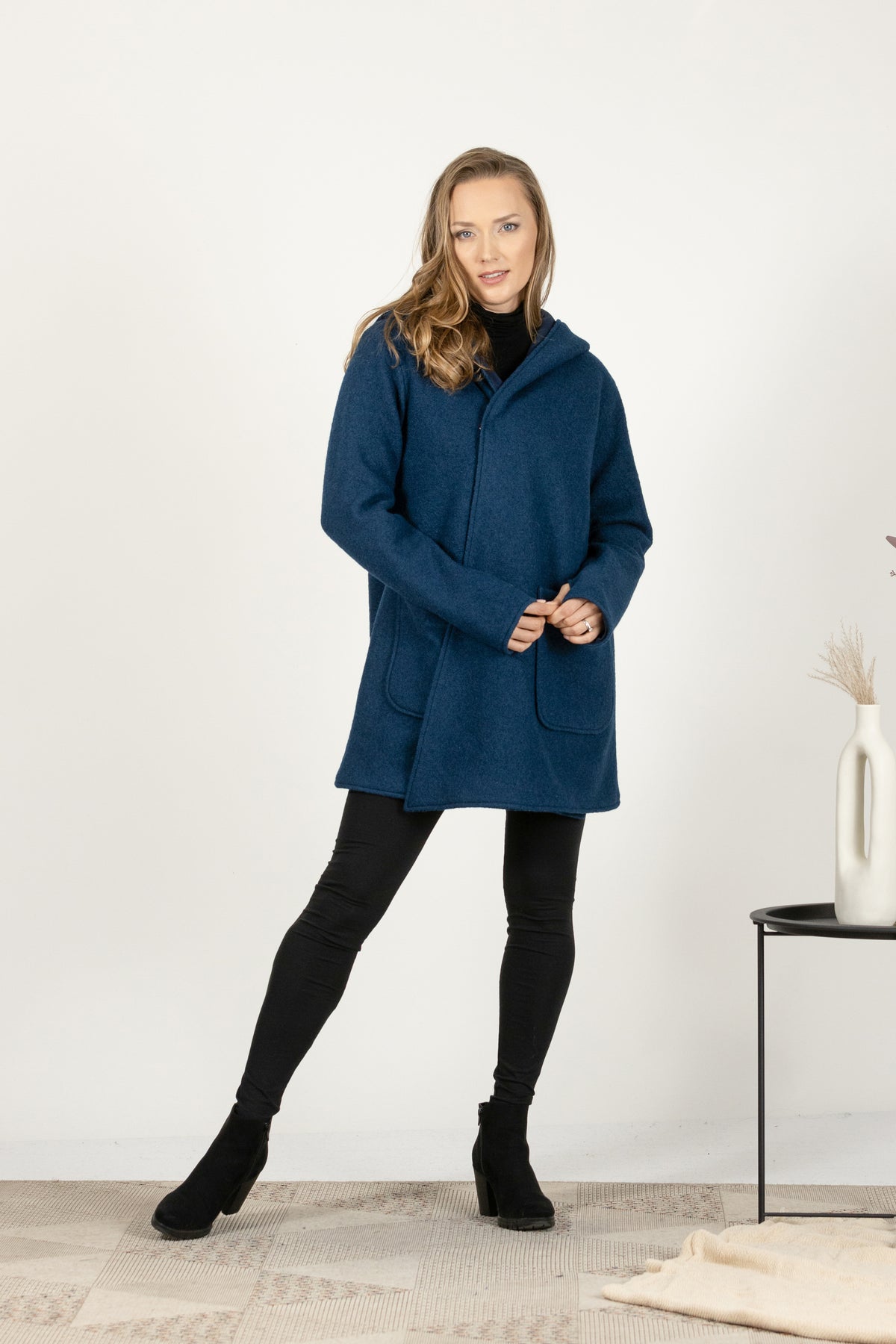 Elegant button-up wool cardigan with hood