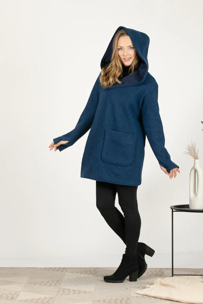 Hooded wool cardigan on model.



