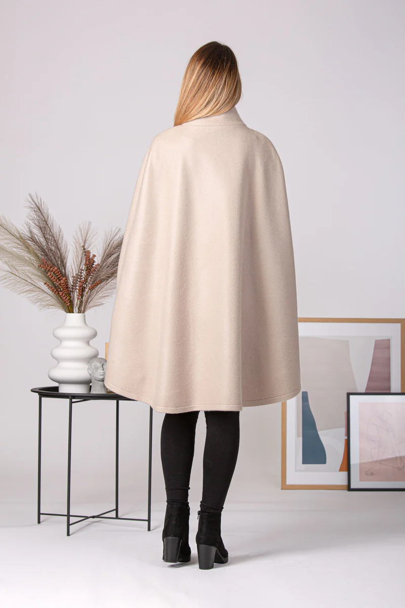 Back view of buttoned poncho

