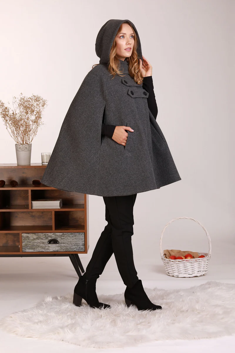 Hooded wool cape coat with elegant drape

