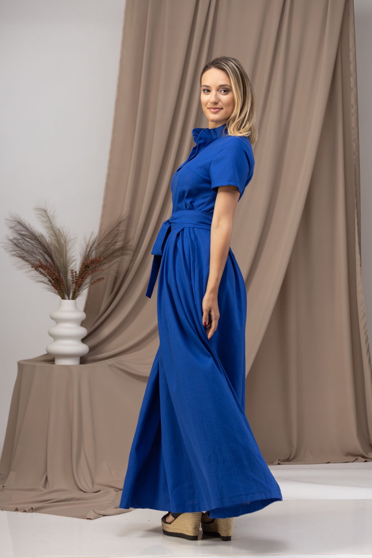 Side view of Elegant Linen Maxi Dress with Short Sleeves and Tie Belt